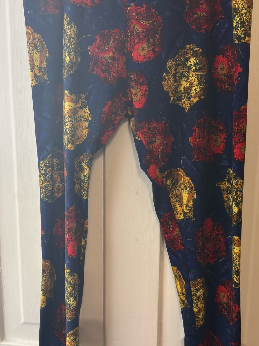 LuLaRoe Navy Leggings with Red & Yellow Abstract Florals
